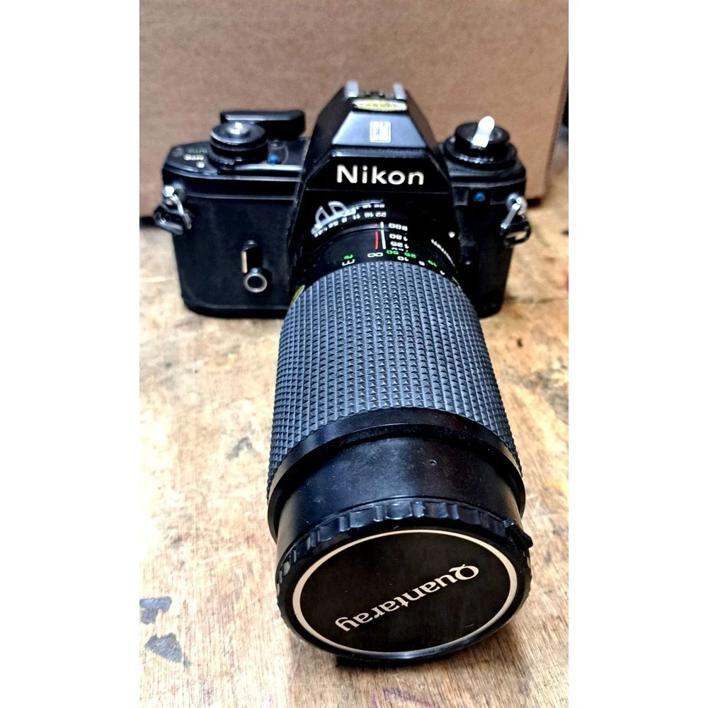 Vintage Nikon EM Black SLR Film Camera + Nikon Lens + Flash + Film + Manuals